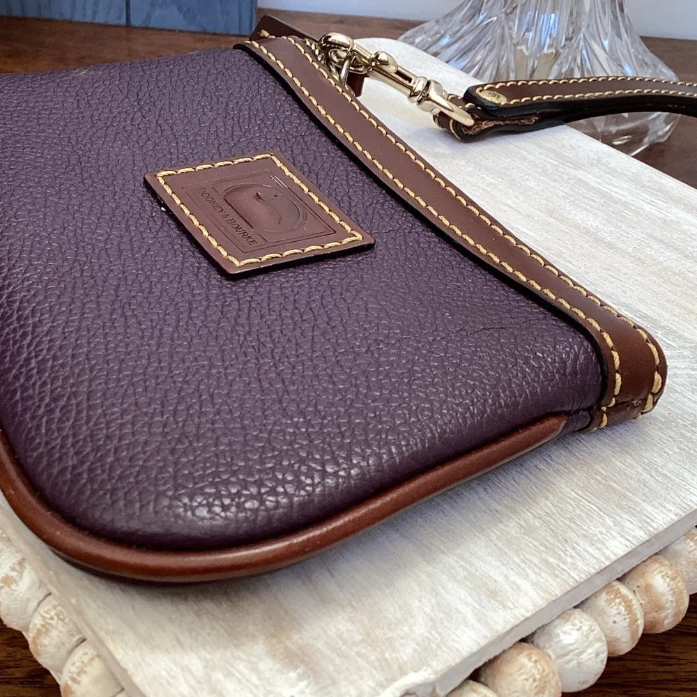 Dooney & Bourke pebbled deep purple and Brown Leather Wristlet, keychain